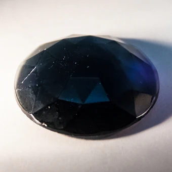 18X25MM OVAL FACETEDSTEEL BLUE